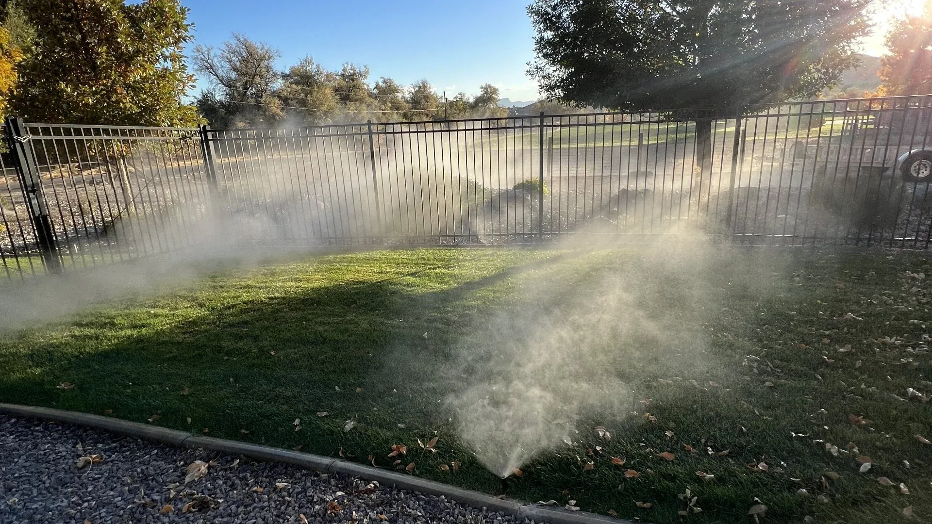 Sprinkler irrigation on a green lawn — water-wise landscaping in Colorado