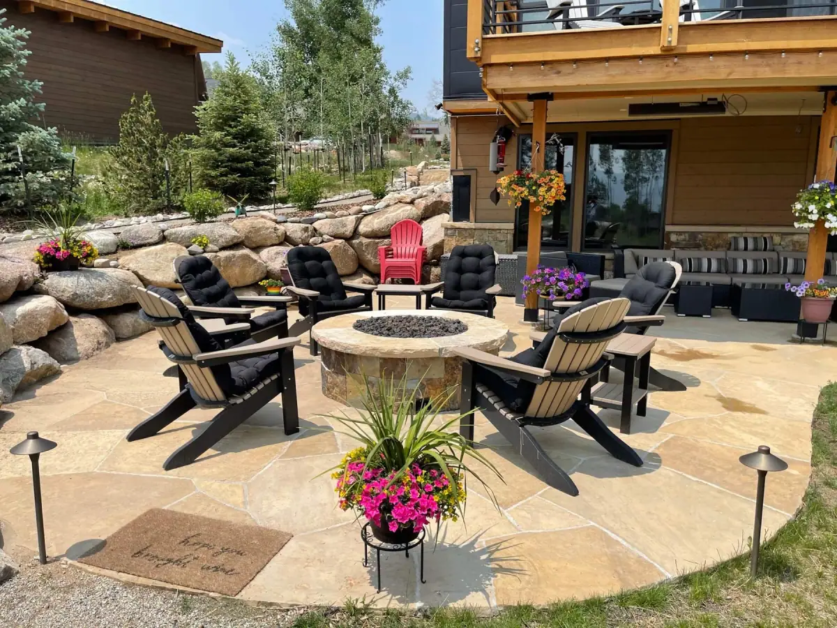 Outdoor living spaces for gathering — patios and resilient mountain landscapes